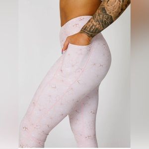 CHAMPAGNE WINTER -feed me fight me . full length leggings. NEVER WORN.